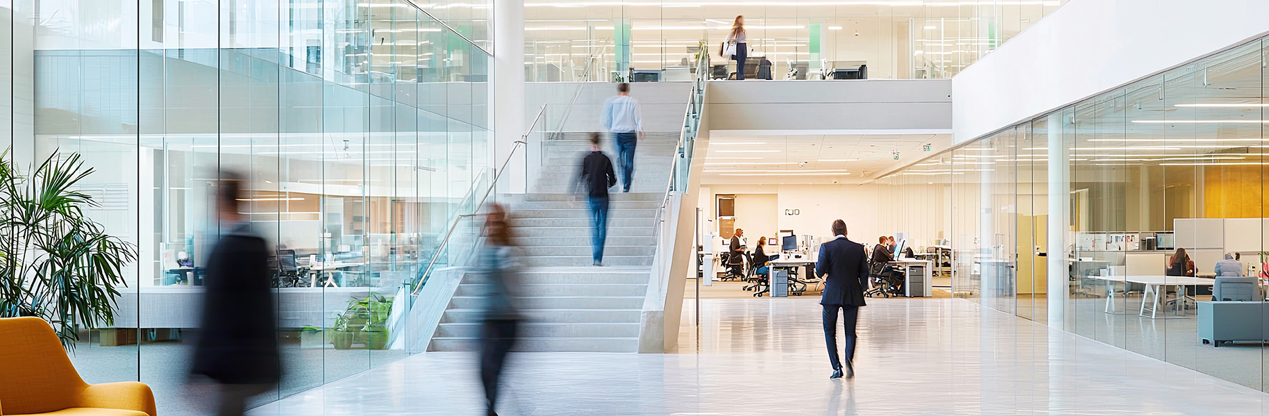 Employees working at global ADNM office.